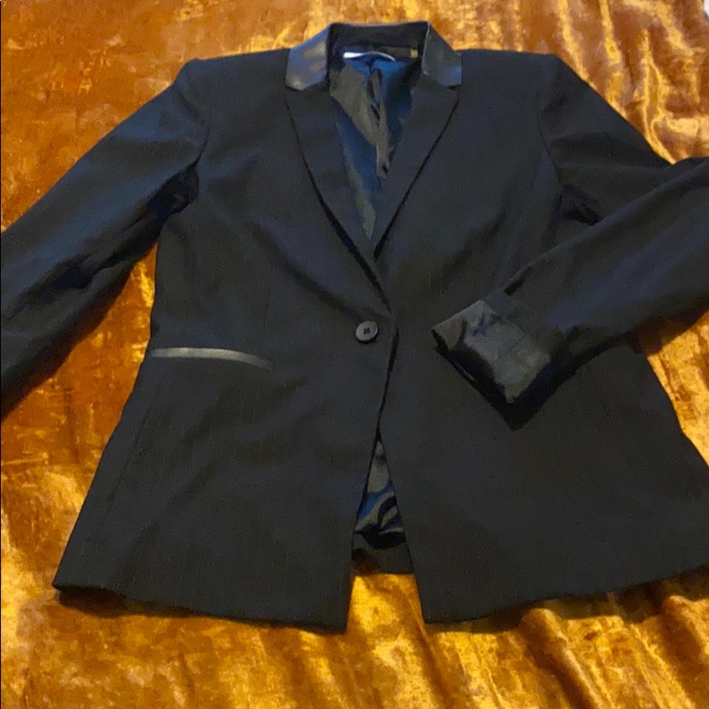 Pinstriped pants suit with leather details